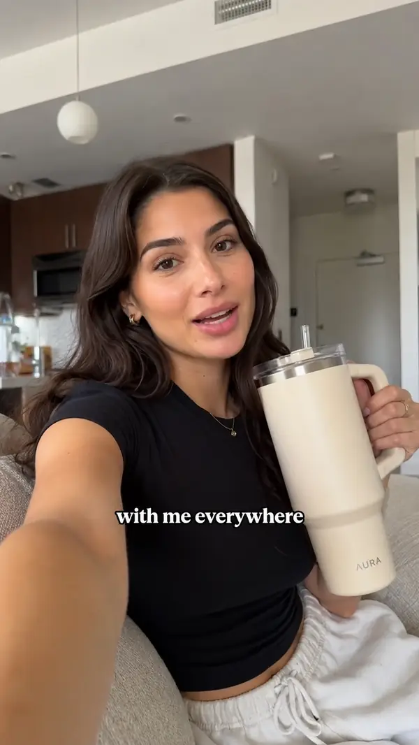 Lifestyle creator video with clean serif captions reading "with me everywhere"